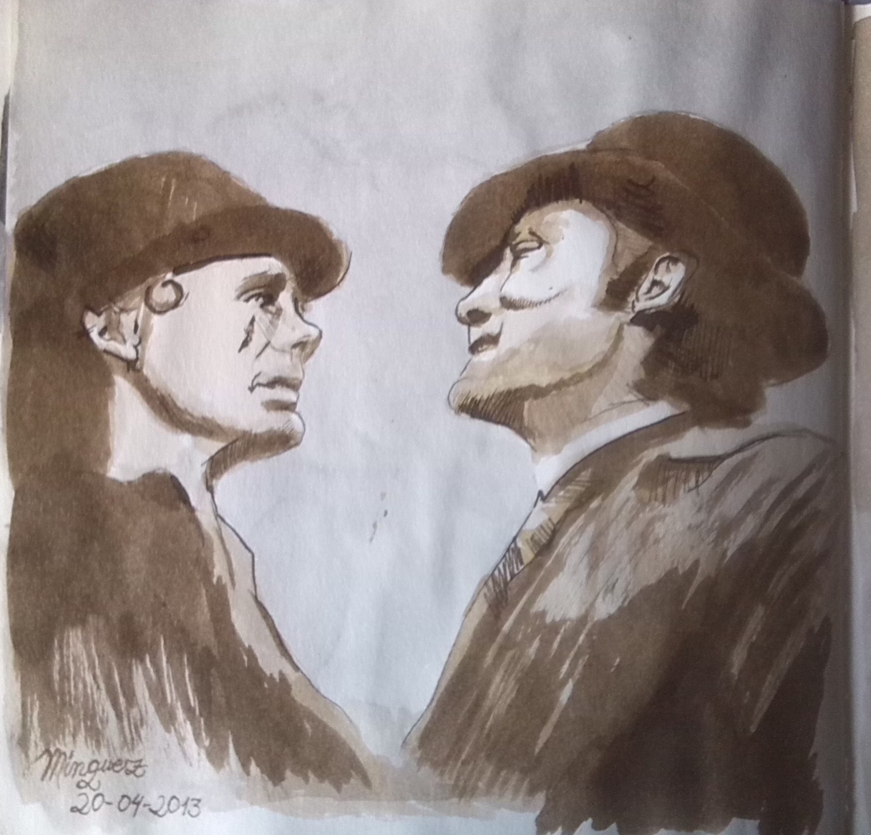 Dos figuras masculinas con sombreros enfrentadas en perfil, realizadas con tinta sepia.